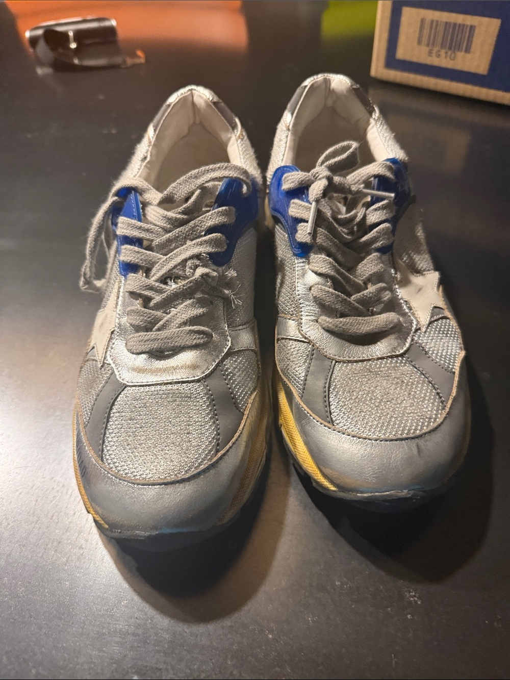 Golden goose super star sneakers in silver/ gray/ white star detail